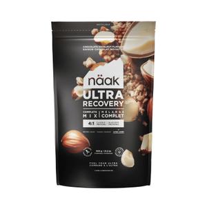 ur-rm-cz-bg-01-e1-chocolate-hazelnut-complete-isotonic-drink-naak-black-beige-brown-600-g